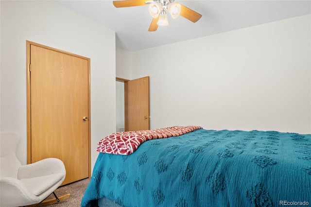 bedroom with ceiling fan and carpet floors