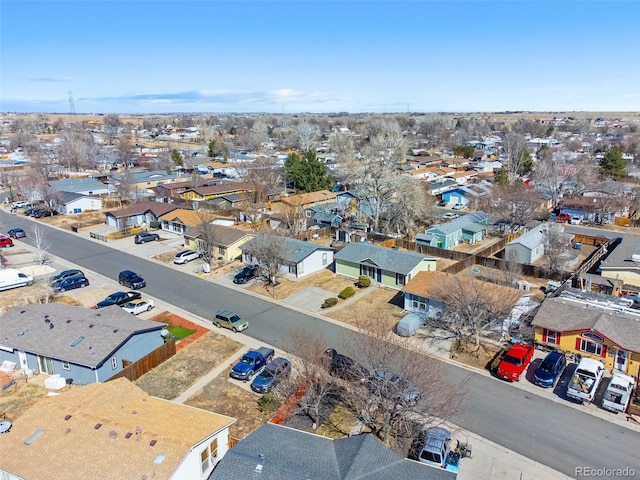 birds eye view of property with a residential view