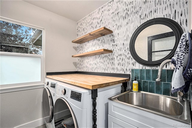 10731 E 151st Pl, Brighton, CO 80602 - clothes washing area featuring plenty of natural light, wallpapered walls, and independent washer and dryer