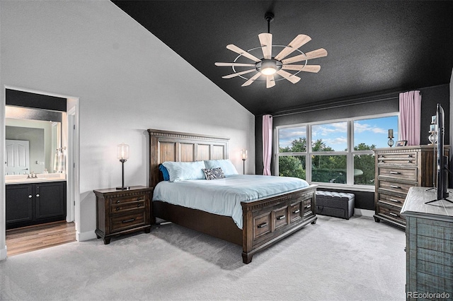 10731 E 151st Pl, Brighton, CO 80602 - bedroom featuring light carpet, a sink, ensuite bath, high vaulted ceiling, and a ceiling fan