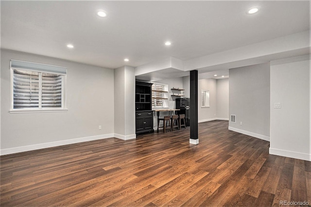 10731 E 151st Pl, Brighton, CO 80602 - basement featuring dark wood-type flooring, baseboards, and recessed lighting