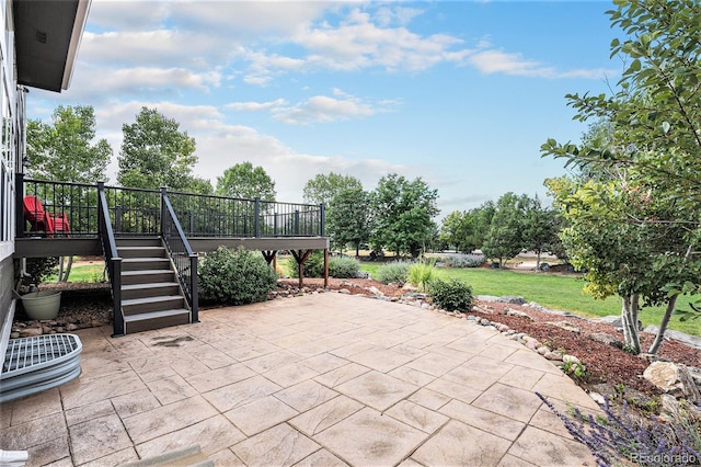 10731 E 151st Pl, Brighton, CO 80602 - view of patio with stairs and a wooden deck