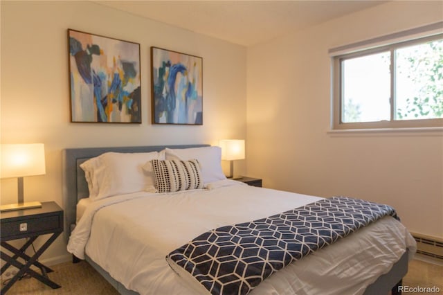 bedroom featuring carpet and baseboard heating