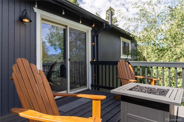 deck featuring a fire pit