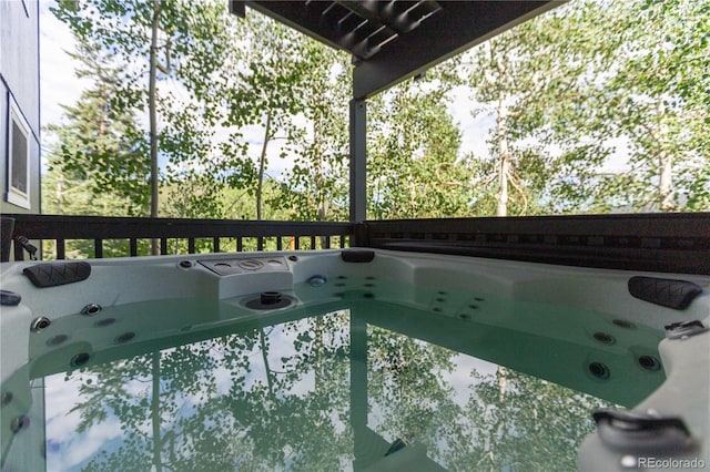 exterior space featuring a hot tub