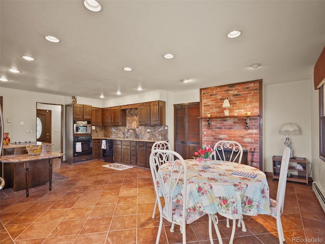 8473 Gray Fox Dr, Evergreen, CO 80439 - dining area featuring light tile patterned floors and recessed lighting