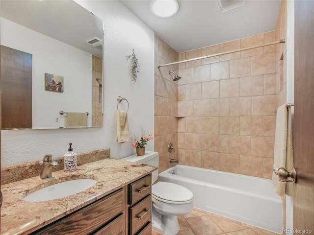 8473 Gray Fox Dr, Evergreen, CO 80439 - full bathroom with shower / bath combination, visible vents, tile patterned flooring, vanity, and toilet