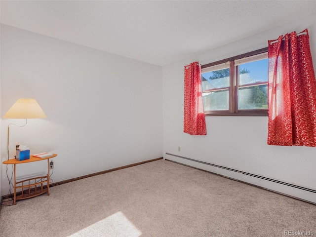 8473 Gray Fox Dr, Evergreen, CO 80439 - empty room with carpet floors, baseboards, and a baseboard radiator