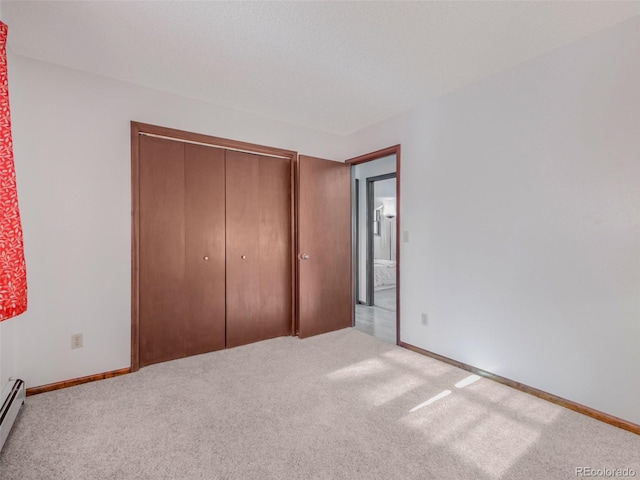 8473 Gray Fox Dr, Evergreen, CO 80439 - unfurnished bedroom featuring baseboards, carpet, and a closet