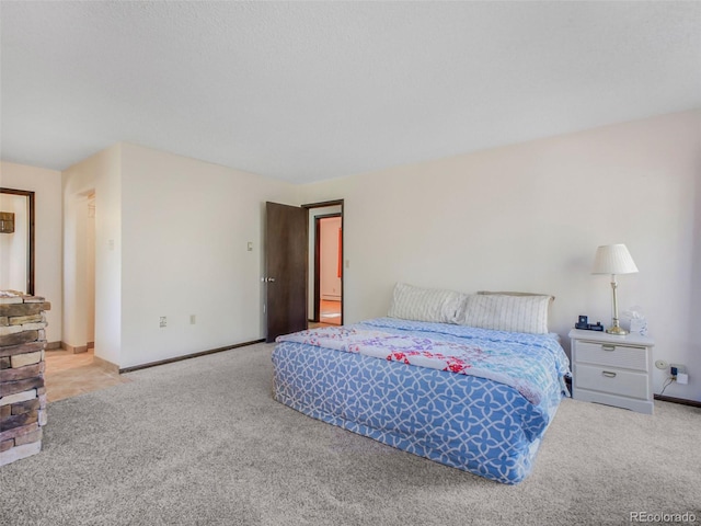 8473 Gray Fox Dr, Evergreen, CO 80439 - carpeted bedroom featuring baseboards