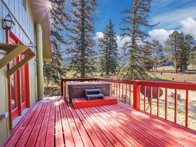 8473 Gray Fox Dr, Evergreen, CO 80439 - wooden deck featuring a hot tub