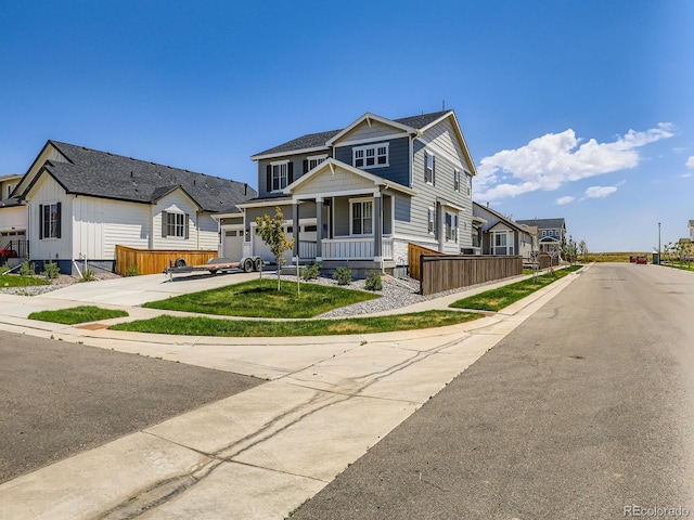 9054 Truckee Ct, Commerce City, CO 80022 - view of front of property featuring a porch and concrete driveway