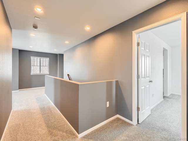 9054 Truckee Ct, Commerce City, CO 80022 - hallway with an upstairs landing, carpet flooring, and recessed lighting