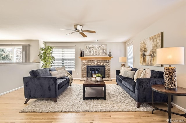 1516 Saltbush Ridge Rd, Highlands Ranch, CO 80126 - living room with wood finished floors, a ceiling fan, and a healthy amount of sunlight