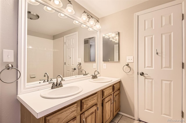 1516 Saltbush Ridge Rd, Highlands Ranch, CO 80126 - bathroom with double vanity, a sink, and tile patterned flooring