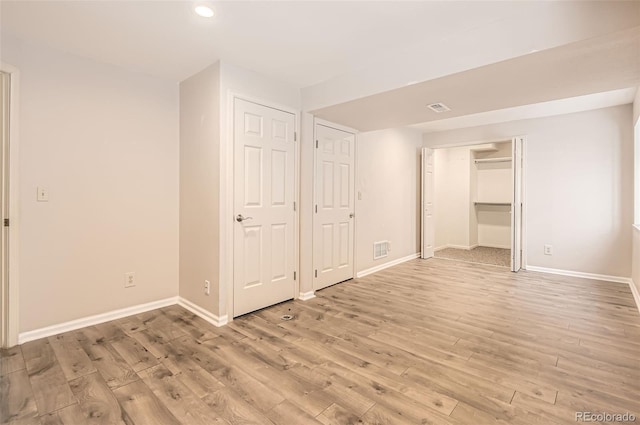 1516 Saltbush Ridge Rd, Highlands Ranch, CO 80126 - unfurnished bedroom with recessed lighting, visible vents, light wood-type flooring, and baseboards