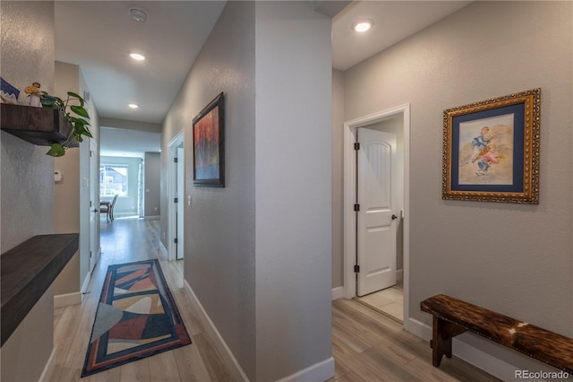 9843 Rosalee Peak St, Littleton, CO 80125 - hall featuring light wood-style flooring, recessed lighting, and baseboards