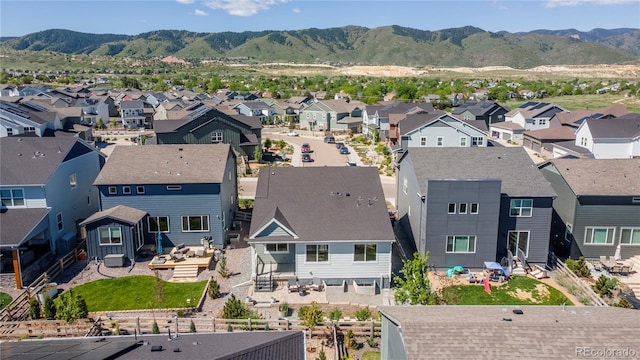 9843 Rosalee Peak St, Littleton, CO 80125 - aerial view of residential area featuring a mountainous background