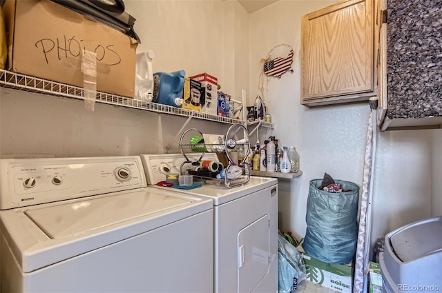 washroom featuring washing machine and dryer