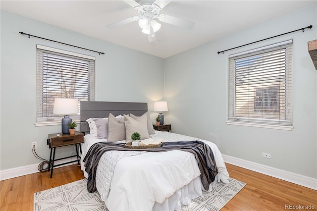 bedroom featuring ceiling fan and hardwood / wood-style floors