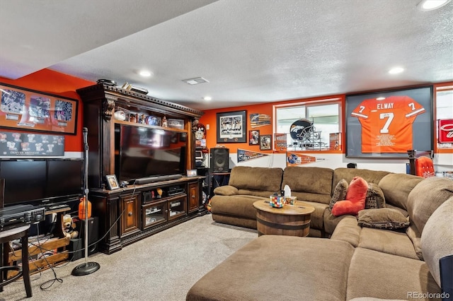 living area featuring recessed lighting, visible vents, carpet flooring, and a textured ceiling