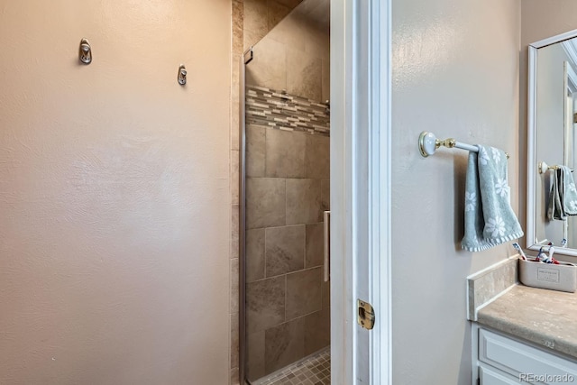 bathroom with vanity and walk in shower