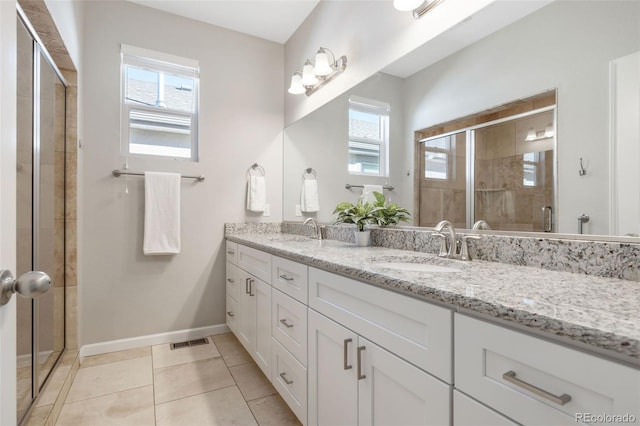 full bathroom with a sink, visible vents, and a wealth of natural light