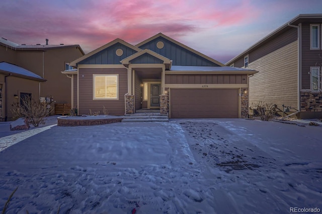 view of front of property with a garage