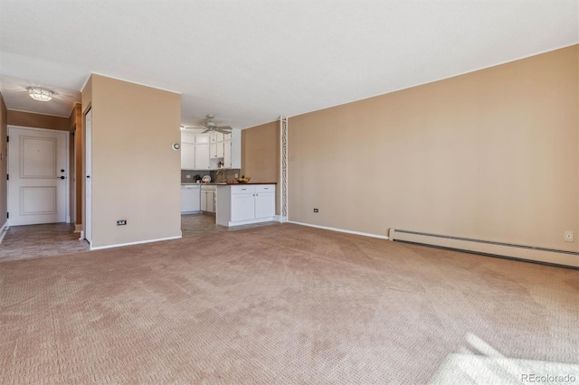 unfurnished living room featuring light colored carpet, a baseboard radiator, and ceiling fan