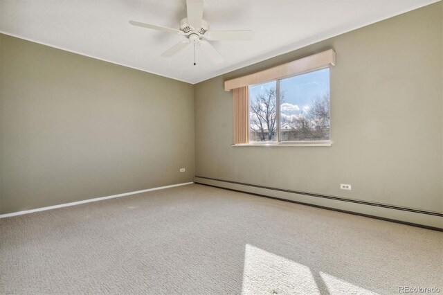 carpeted empty room featuring ceiling fan and a baseboard radiator