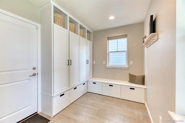 15389 W 50th Dr, Golden, CO 80403 - mudroom featuring light tile patterned flooring, recessed lighting, and baseboards