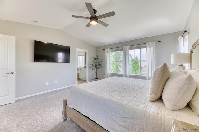 15389 W 50th Dr, Golden, CO 80403 - carpeted bedroom featuring lofted ceiling, baseboards, a ceiling fan, and ensuite bathroom