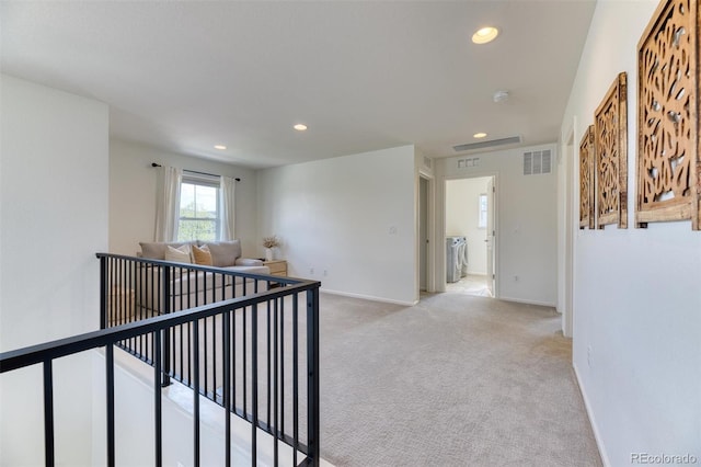 15389 W 50th Dr, Golden, CO 80403 - hallway with washer and clothes dryer, recessed lighting, light carpet, an upstairs landing, and baseboards