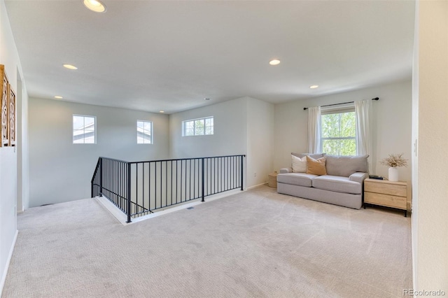15389 W 50th Dr, Golden, CO 80403 - sitting room featuring plenty of natural light, carpet flooring, recessed lighting, an upstairs landing, and baseboards