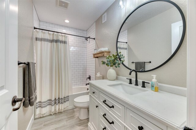15389 W 50th Dr, Golden, CO 80403 - full bathroom with toilet, vanity, and shower / bath combo