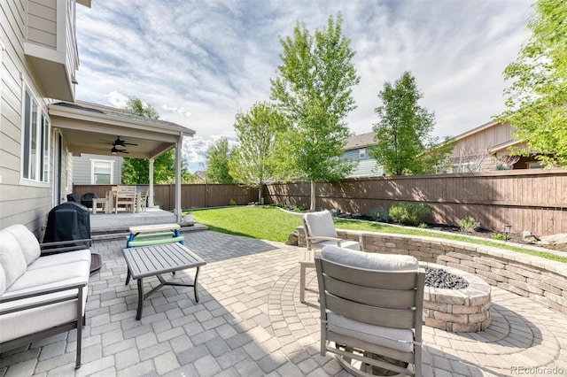 15389 W 50th Dr, Golden, CO 80403 - view of patio / terrace with a ceiling fan and a fire pit