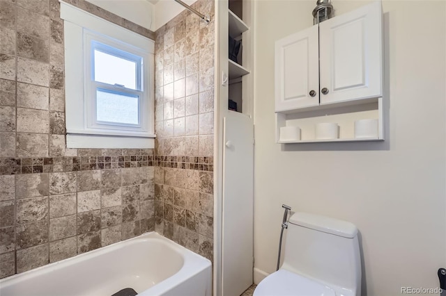 bathroom featuring toilet and shower / bath combination