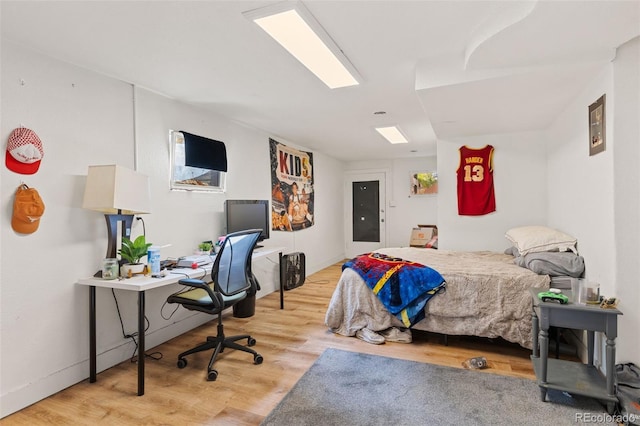 bedroom featuring light hardwood / wood-style floors