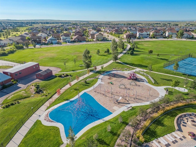 aerial view of residential area featuring a pool