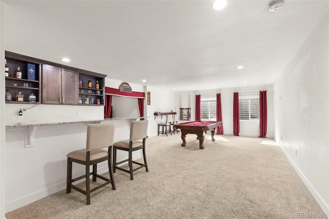 game room featuring pool table, light carpet, recessed lighting, baseboards, and bar