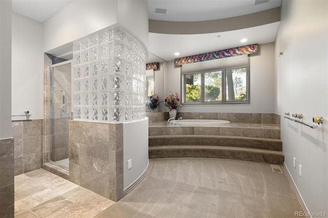 bathroom featuring visible vents, tiled shower, a bath, and recessed lighting