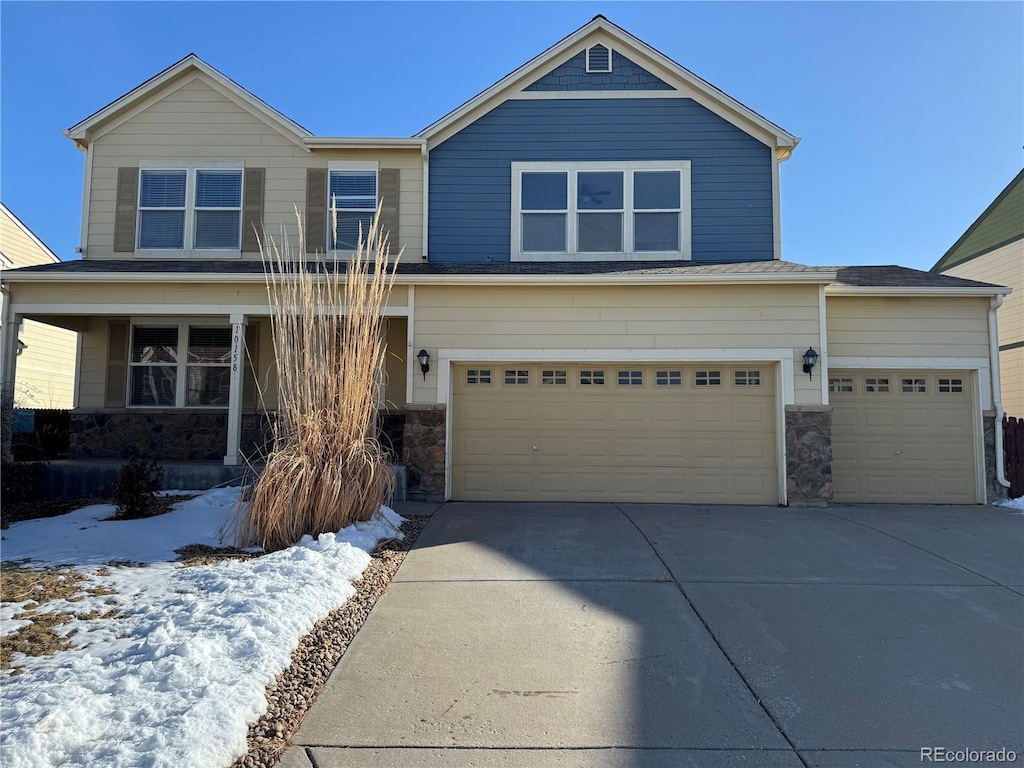 view of front of property featuring a garage