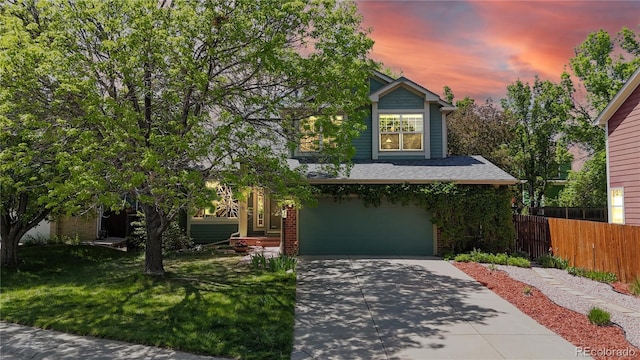 view of front of house with a garage, concrete driveway, and brick siding