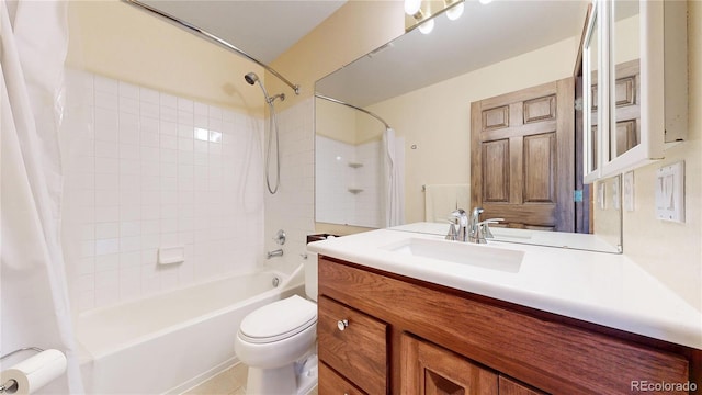 full bath with shower / tub combo with curtain, toilet, and vanity