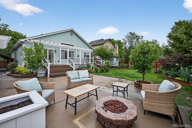 7330 Cotton Dr, Colorado Springs, CO 80923 - view of patio / terrace featuring an outdoor living space with a fire pit and a wooden deck