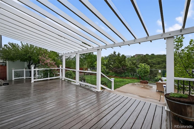 7330 Cotton Dr, Colorado Springs, CO 80923 - wooden deck featuring a pergola and an outdoor fire pit