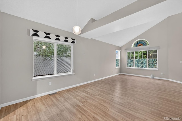 7330 Cotton Dr, Colorado Springs, CO 80923 - unfurnished room featuring wood finished floors, high vaulted ceiling, and baseboards