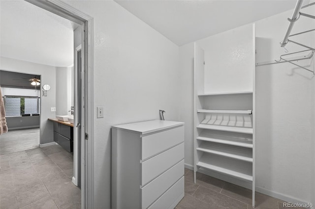 7330 Cotton Dr, Colorado Springs, CO 80923 - walk in closet with tile patterned floors and a ceiling fan