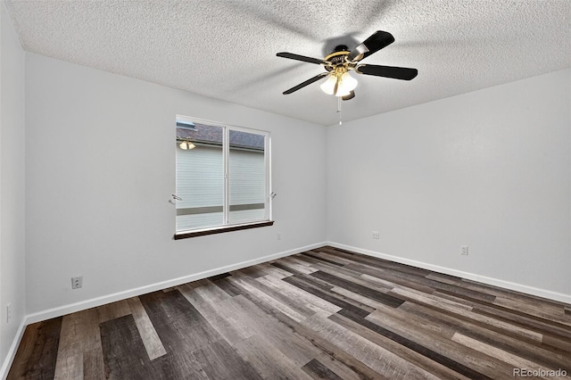 7330 Cotton Dr, Colorado Springs, CO 80923 - unfurnished room featuring dark wood finished floors, a ceiling fan, a textured ceiling, and baseboards