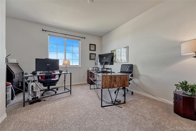 office featuring baseboards and carpet floors